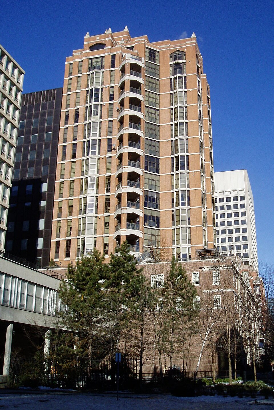 The Windsor Arms Hotel's condo tower rising behind the preserved 1927 facade on St. Thomas Street.