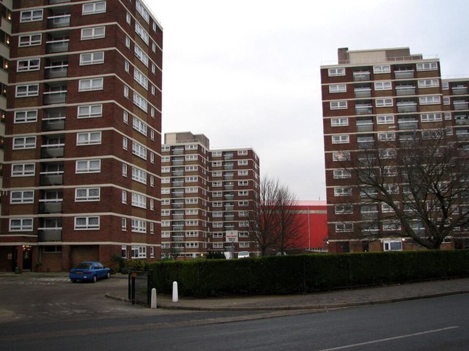 Whitemead House on Duckmoor Road, a plain high rise tower block with Ashton Gate Stadium behind it.