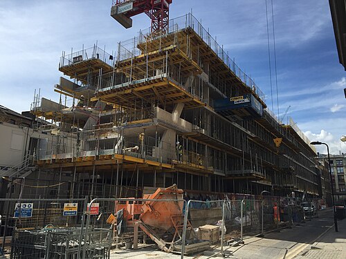 A concrete frame going up on Willow Street with the formwork and the crane still on it.