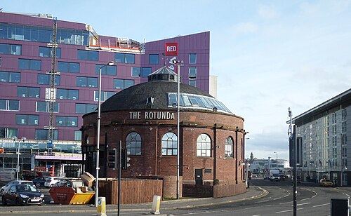 The North Rotunda on Tunnel Street, a round red brick building with THE ROTUNDA lettered across the front and a hotel behind it.