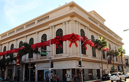 The corner of Rodeo Drive and Brighton Way, a David Yurman storefront wrapped in a giant red ribbon and bows for the holidays.