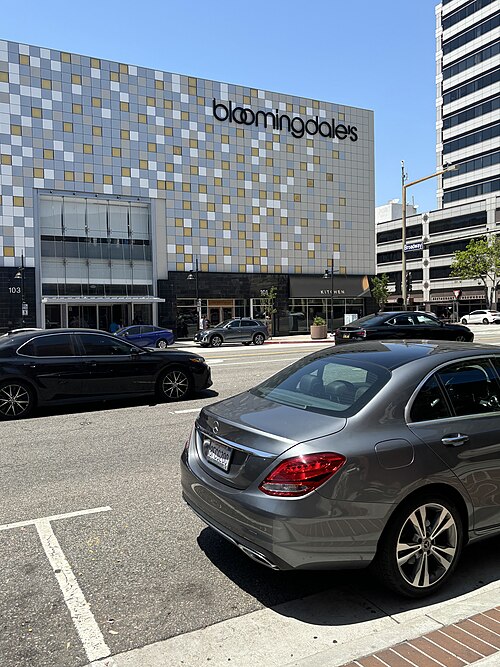 The Glendale Galleria's Bloomingdale's storefront facing Broadway, a gold and silver tiled facade over the entrance.