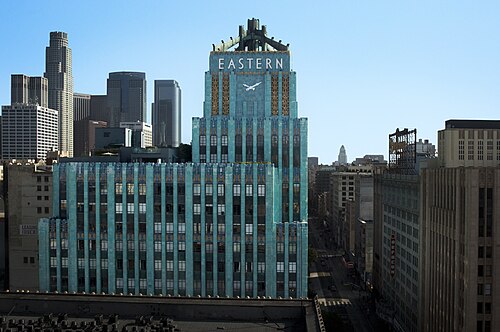 The Eastern Columbia's turquoise terra cotta tower with Broadway running north below.