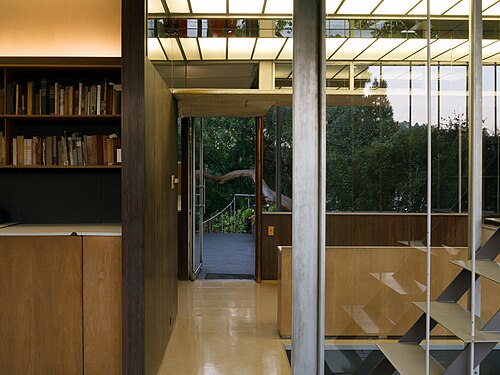 Inside the Neutra VDL house, the library shelves and the stairs up to the penthouse.