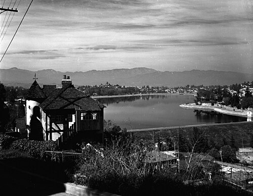 The Silver Lake Reservoir in a 1956 Los Angeles Times photograph, with a Tudor-style house on the near hillside.