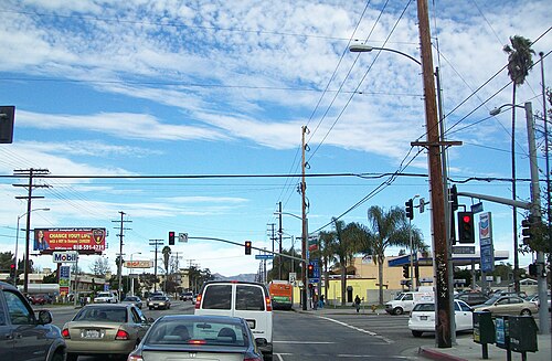 Sepulveda Boulevard at Sherman Way, gas stations on two corners, a Big Lots sign and traffic backed up at the light.