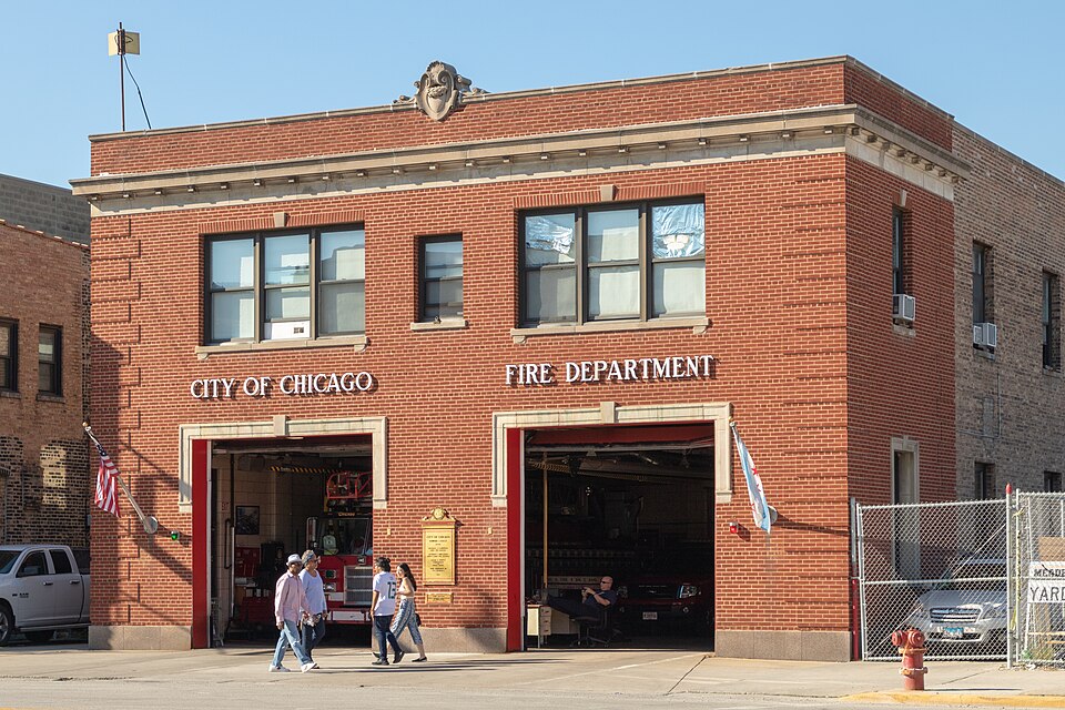 Engine Company 8's two bay firehouse on West Cermak Road, City of Chicago Fire Department lettered across the brick front.