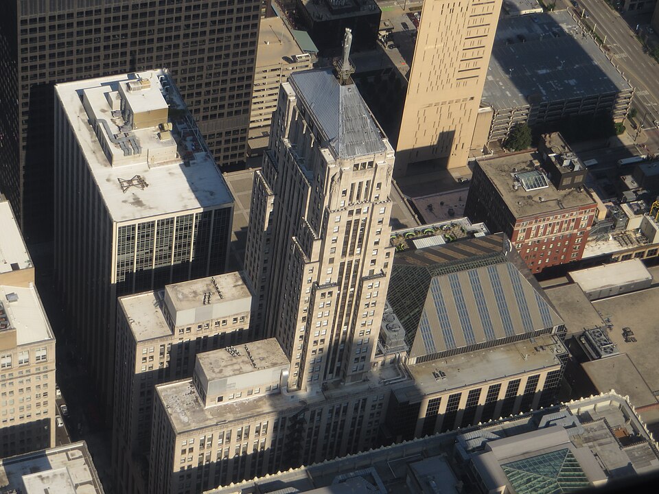 The Chicago Board of Trade Building's limestone Art Deco tower and stepped setbacks, seen from above at the foot of the LaSalle Street canyon.