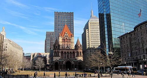 Trinity Church's Romanesque tower and stone gables on Copley Square, modern office towers rising behind it.