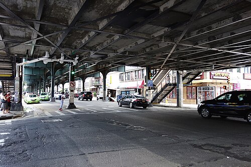 Street level under the elevated subway at 30th Avenue and 31st Street.