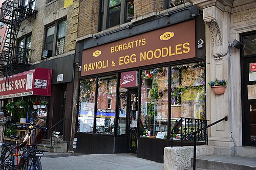 Borgatti's Ravioli and Egg Noodles at 632 East 187th Street, the storefront sign that was recreated for the Broadway set of A Bronx Tale, a flower shop next door.