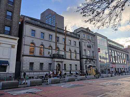 The Jamaica Center for Arts & Learning and the Jamaica Savings Bank building on Jamaica Avenue, a Target and a Burlington filling the storefronts across the street.