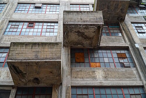 The atrium inside Warehouse B at the Brooklyn Army Terminal, concrete loading balconies staggered out over the well.