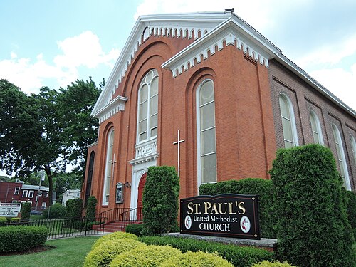 St. Paul's United Methodist Church at Swinnerton Street and Amboy Road, a red brick building with round arched windows.