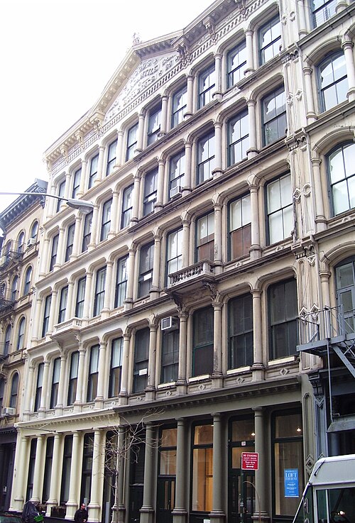 The Woods Mercantile Buildings on White Street, cast iron and marble bays under a pedimented gable.